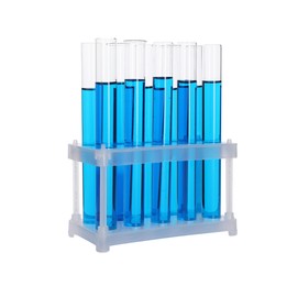 Photo of Many test tubes with light blue liquid in stand isolated on white
