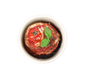 Photo of Baked eggplant with tomatoes, cheese and basil in ramekin isolated on white, top view