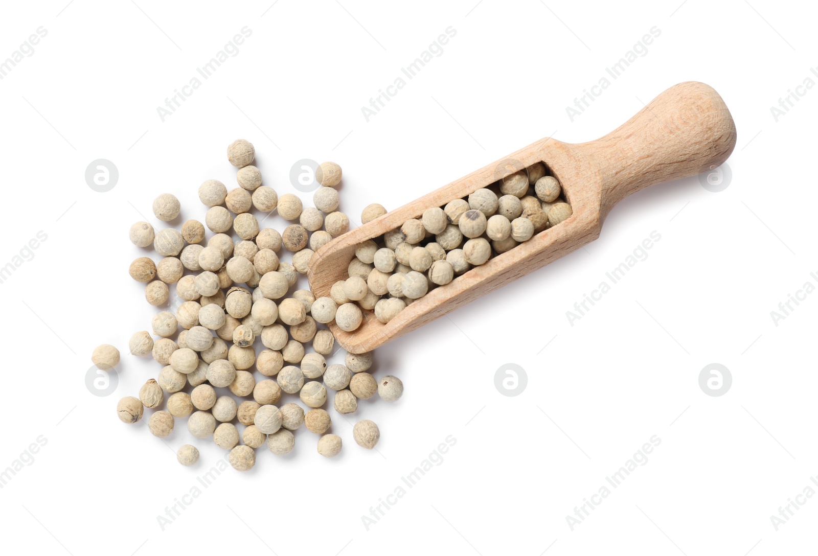 Photo of Aromatic spice. Many peppercorns in scoop isolated on white, top view