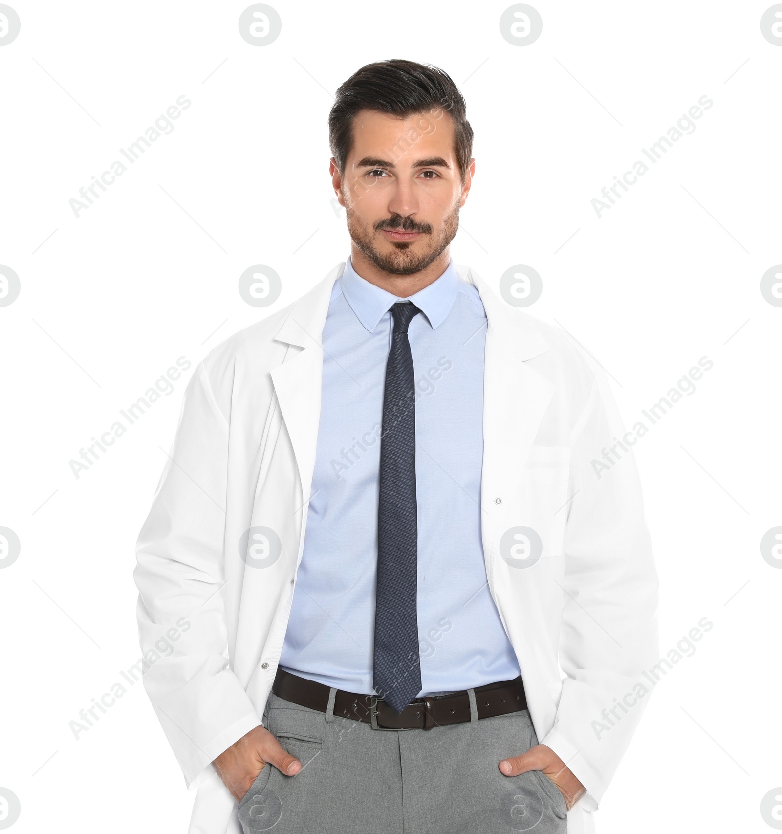 Photo of Portrait of young male doctor on white background. Medical service
