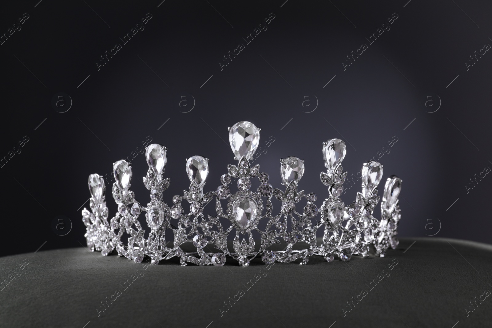 Photo of Beautiful silver tiara with diamonds on grey table