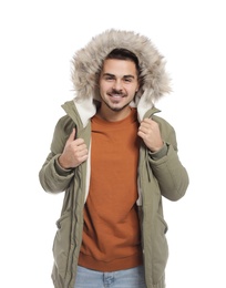 Photo of Young man wearing warm clothes on white background. Ready for winter vacation