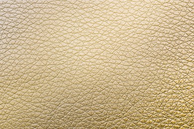 Image of Golden textured surface as background, closeup view