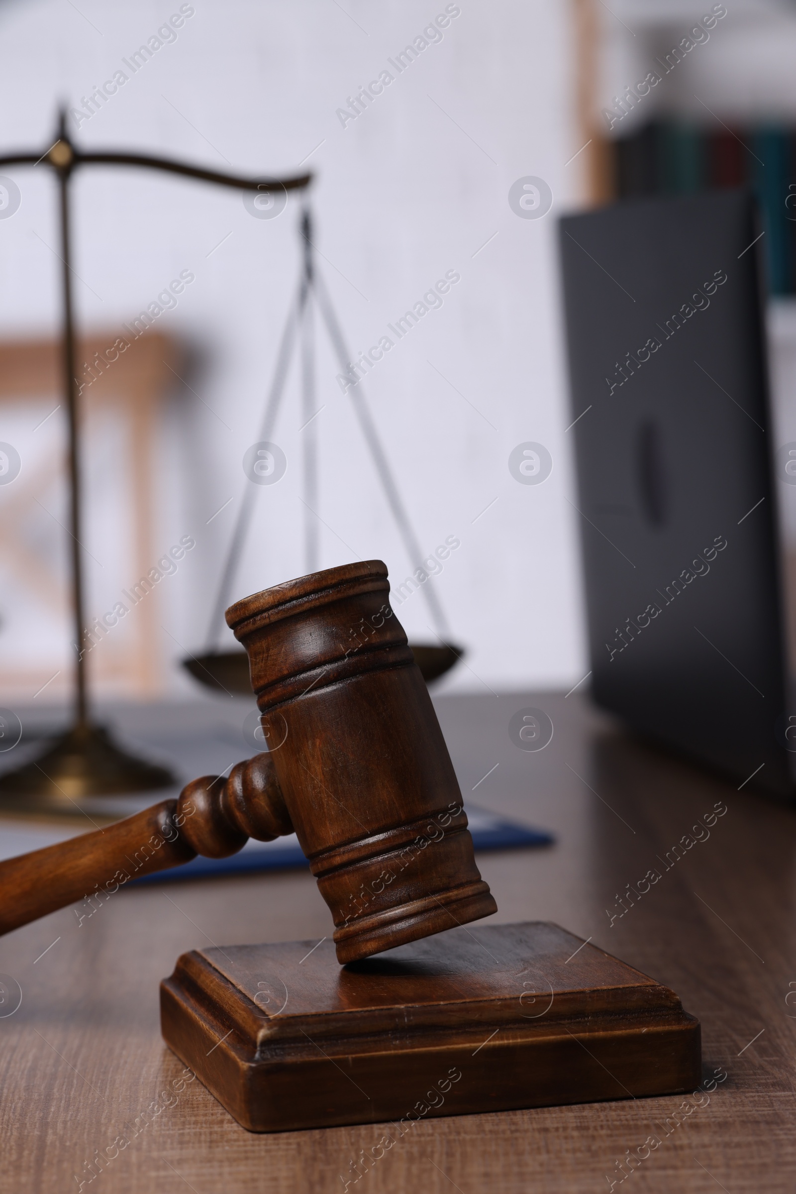 Photo of Law concept. Judge or jurist workplace with mallet, closeup