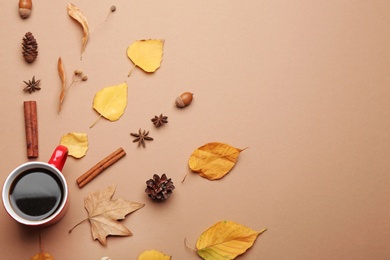 Flat lay composition with hot drink on beige background, space for text. Cozy autumn