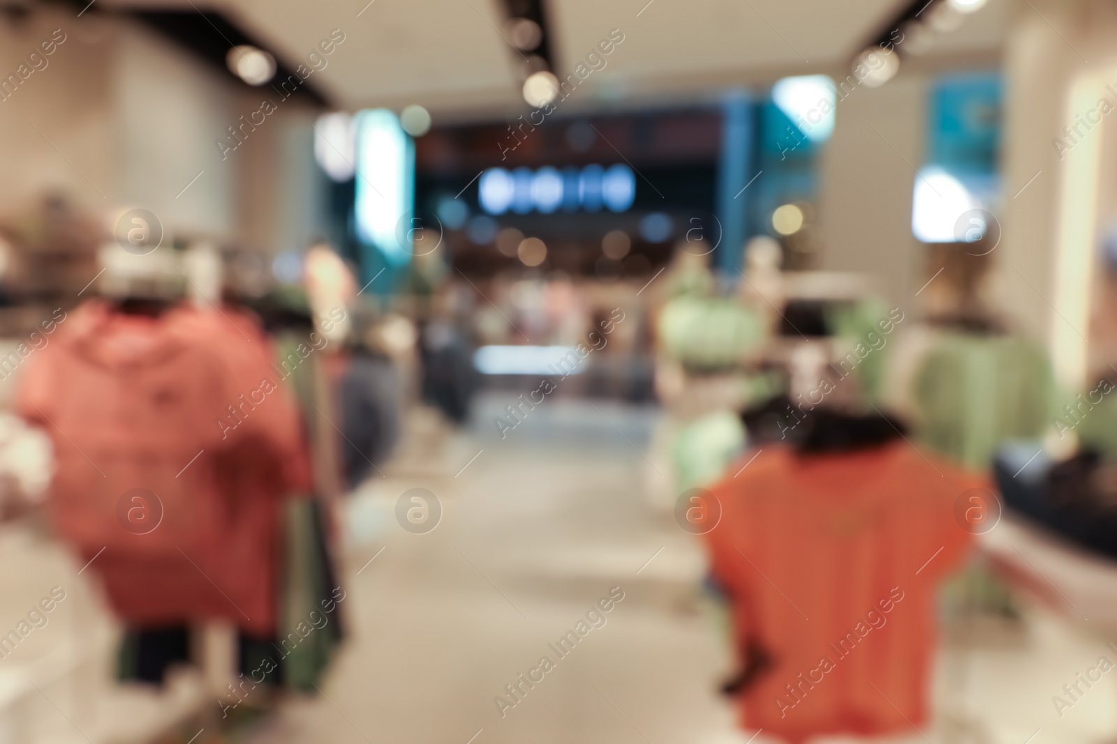 Photo of Blurred view of store interior in shopping mall. Bokeh effect