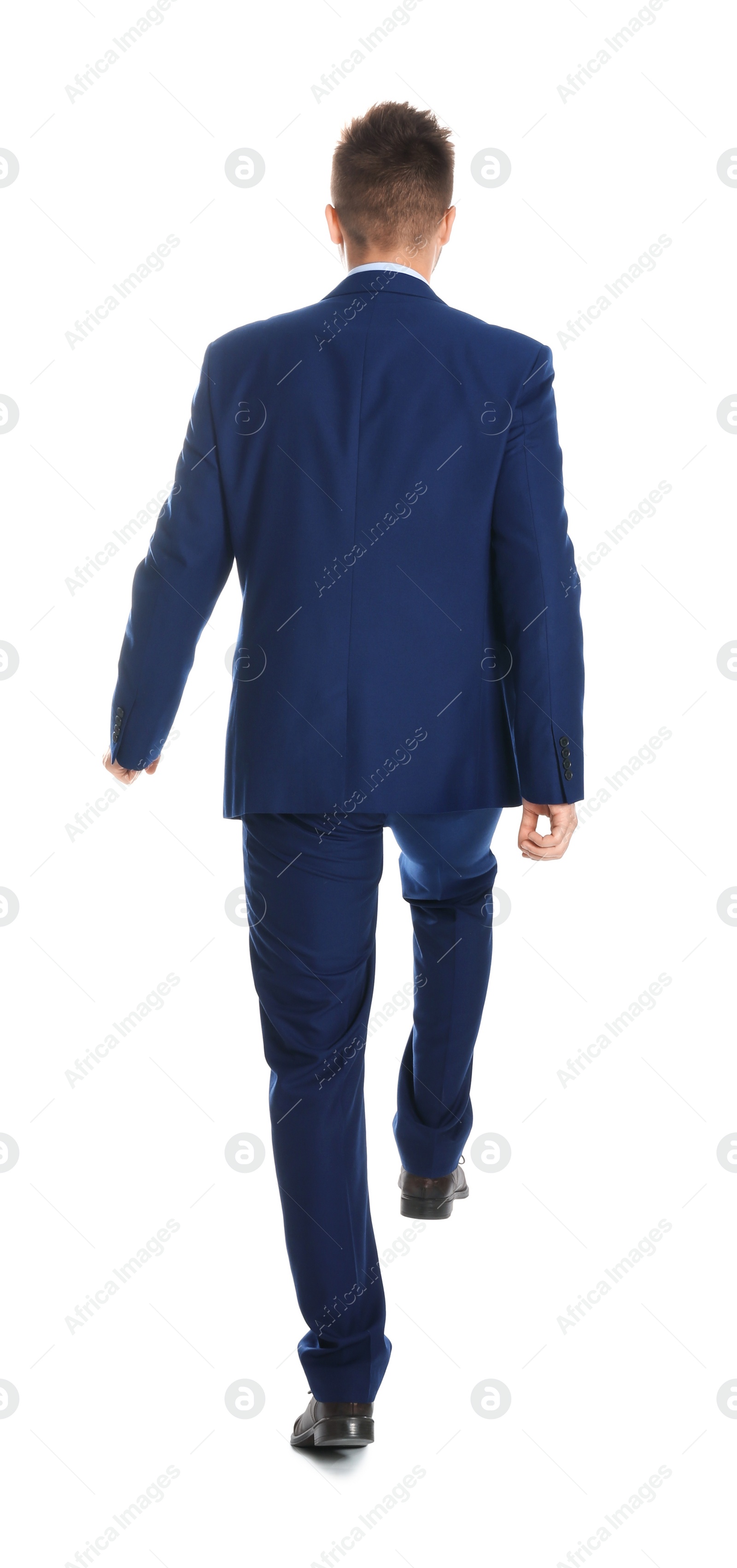 Photo of Businessman walking on white background, back view. Career ladder