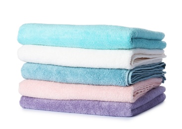 Photo of Stack of folded towels on white background
