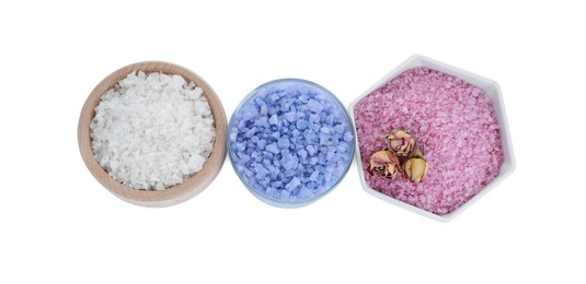 Photo of Different sea salt and dry rose flowers isolated on white, top view