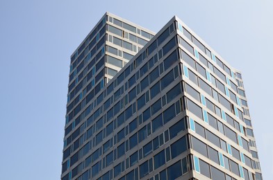 Photo of Exterior of beautiful modern building against blue sky