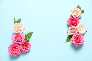 Photo of Happy Mother's Day. Beautiful roses on light blue background, flat lay. Space for text