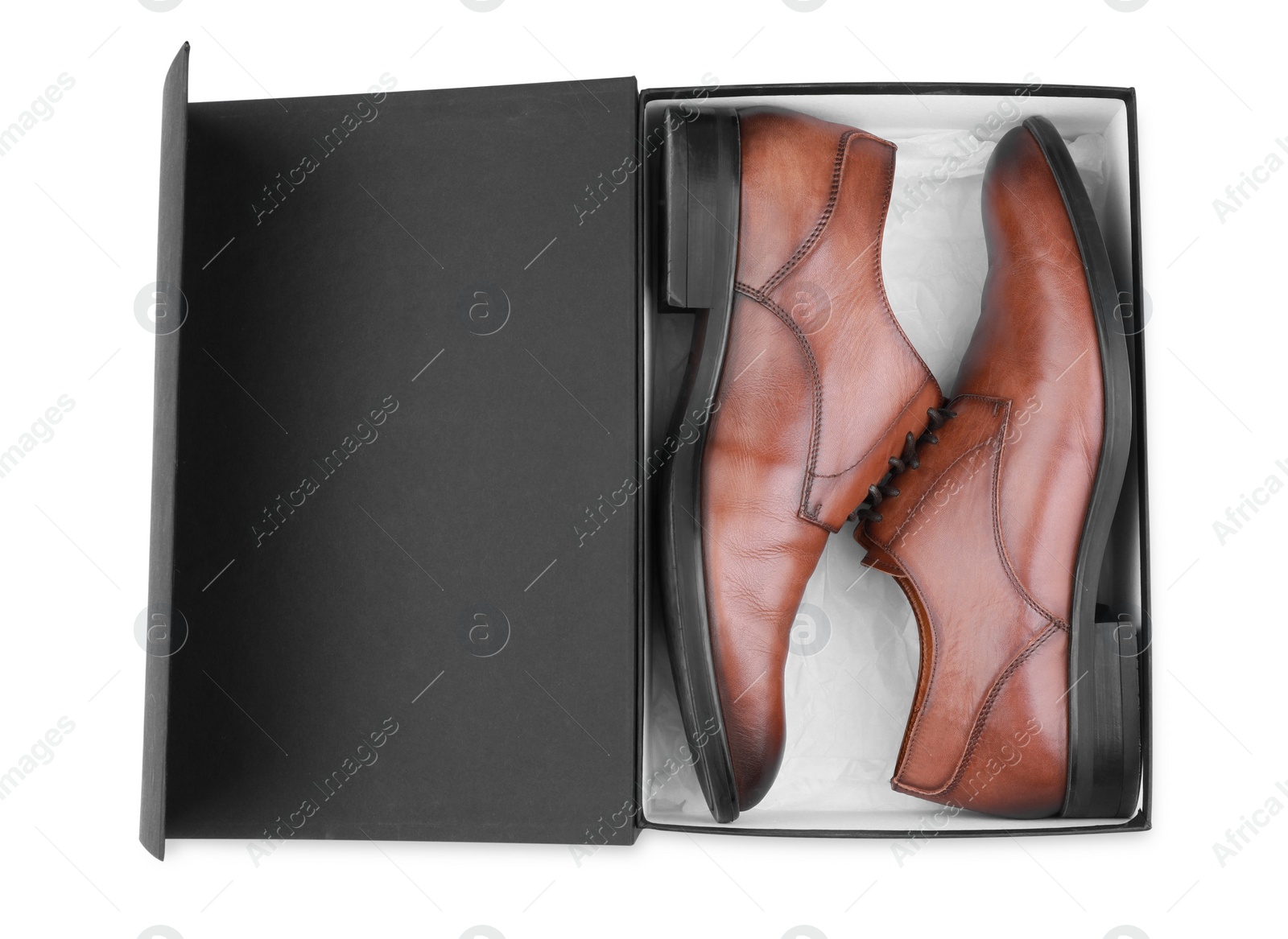Photo of Pair of stylish leather shoes in black box on white background, top view