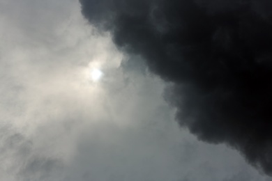 Photo of Sky with heavy rainy clouds on grey day