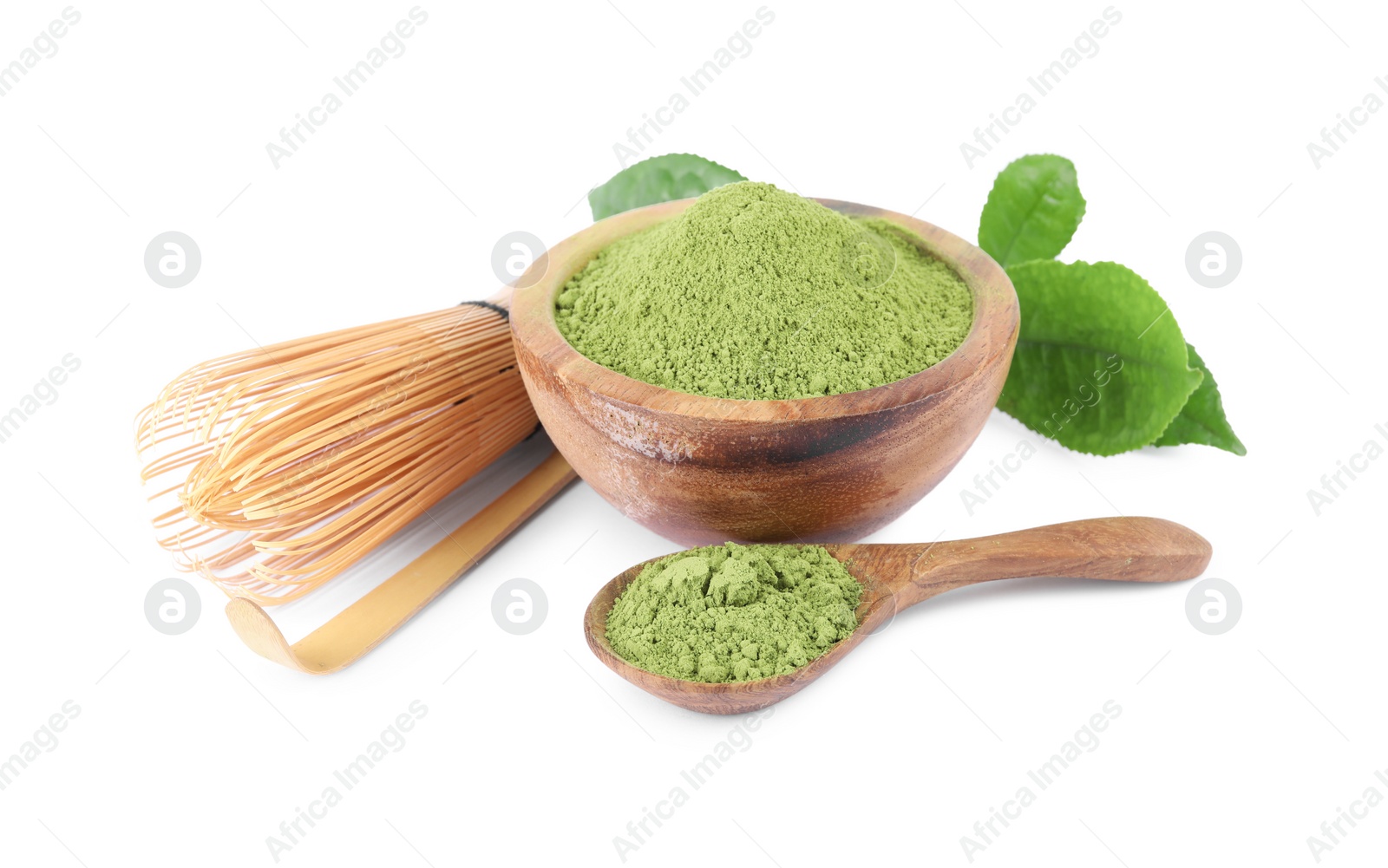 Photo of Bamboo whisk, bowl and spoon with green matcha powder isolated on white