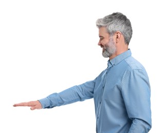 Photo of Mature businessman in stylish clothes posing on white background