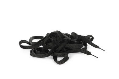 Photo of Long black shoe laces on white background