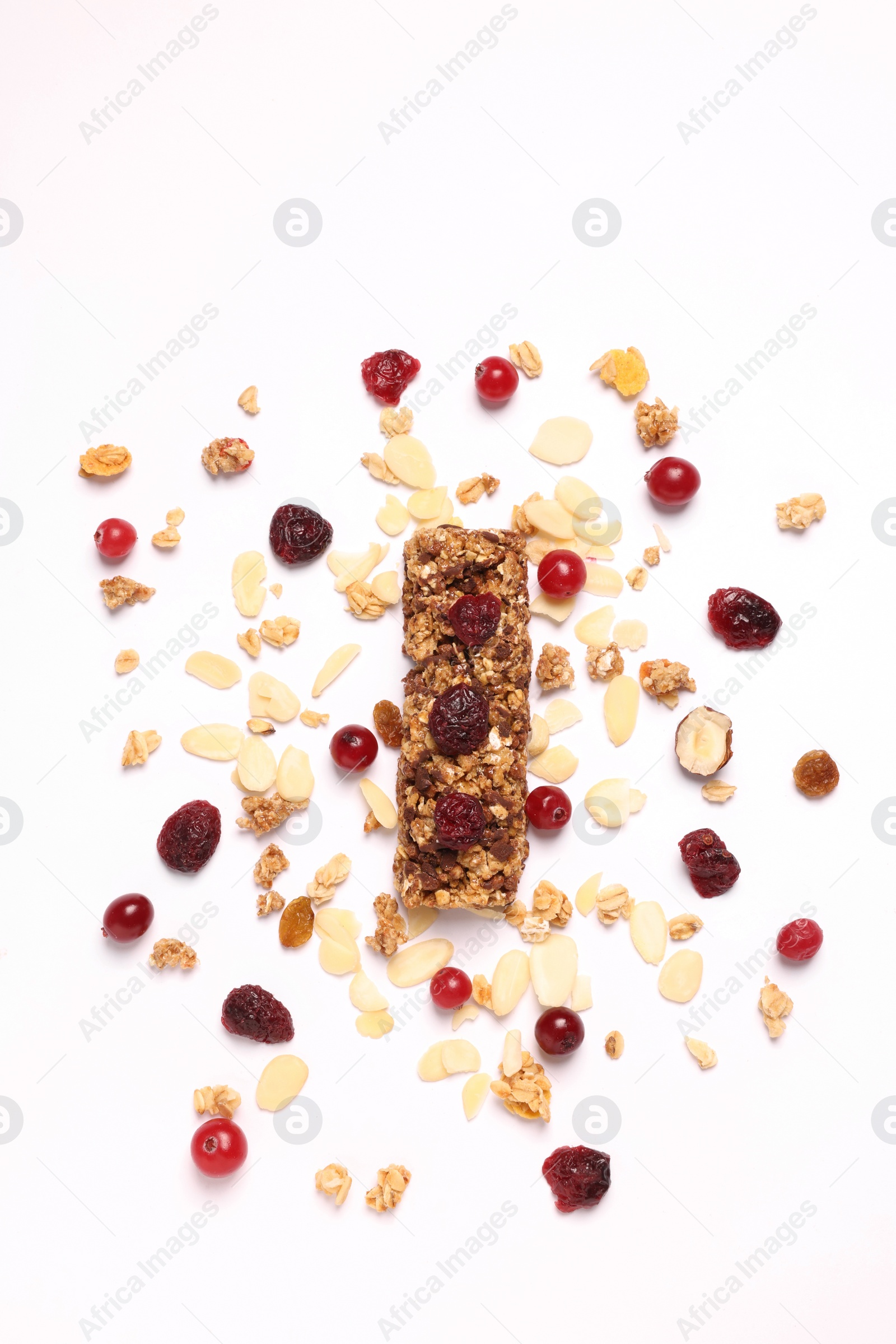 Photo of Tasty granola bar and ingredients isolated on white, top view