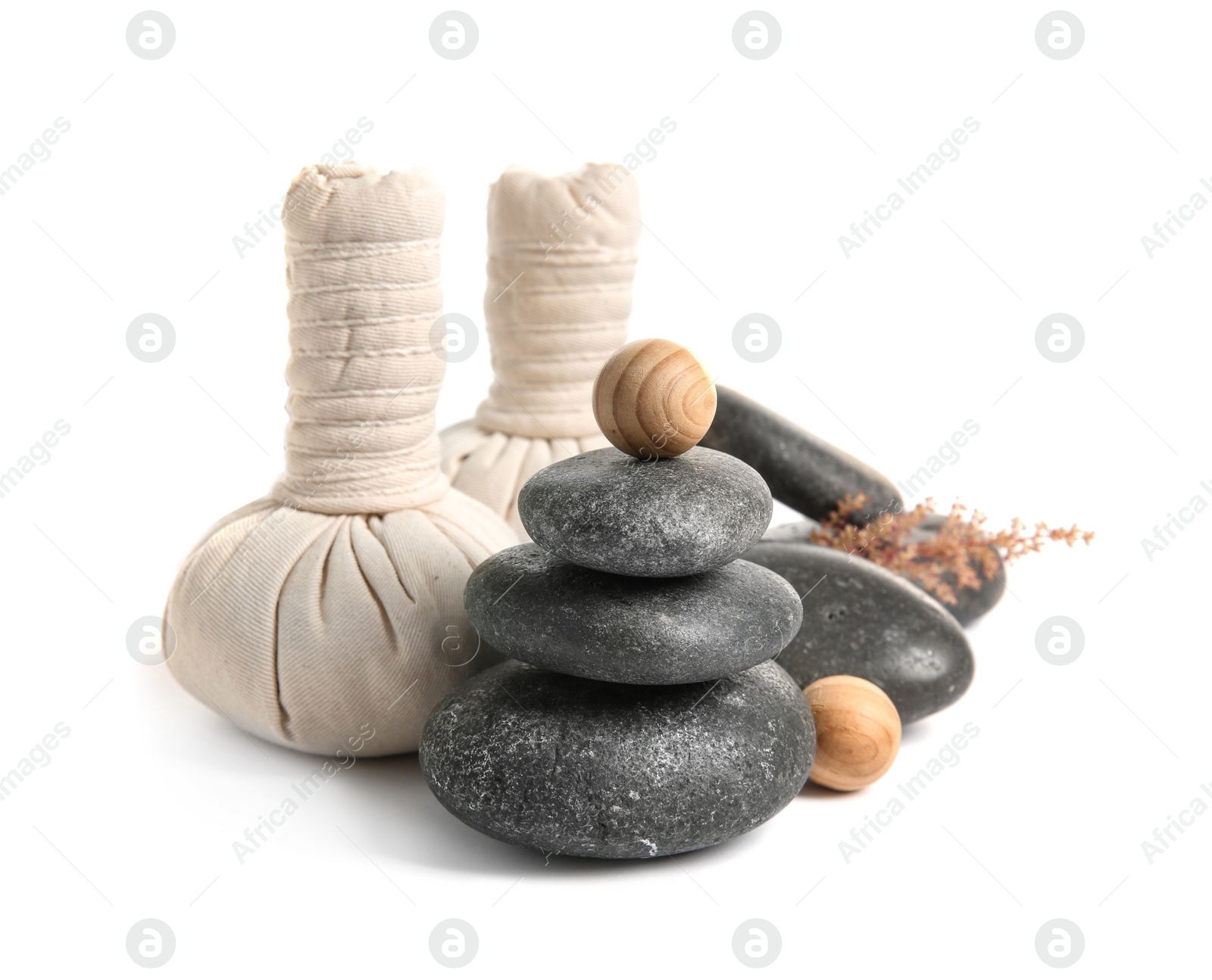 Photo of Beautiful composition with spa stones on white background