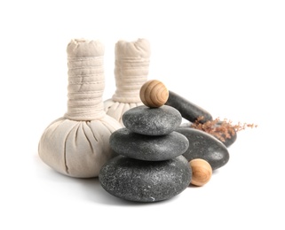 Photo of Beautiful composition with spa stones on white background