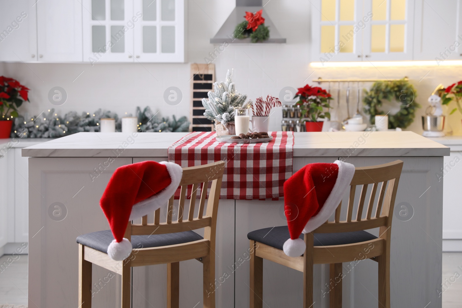 Photo of Beautiful kitchen interior with stylish Christmas decor