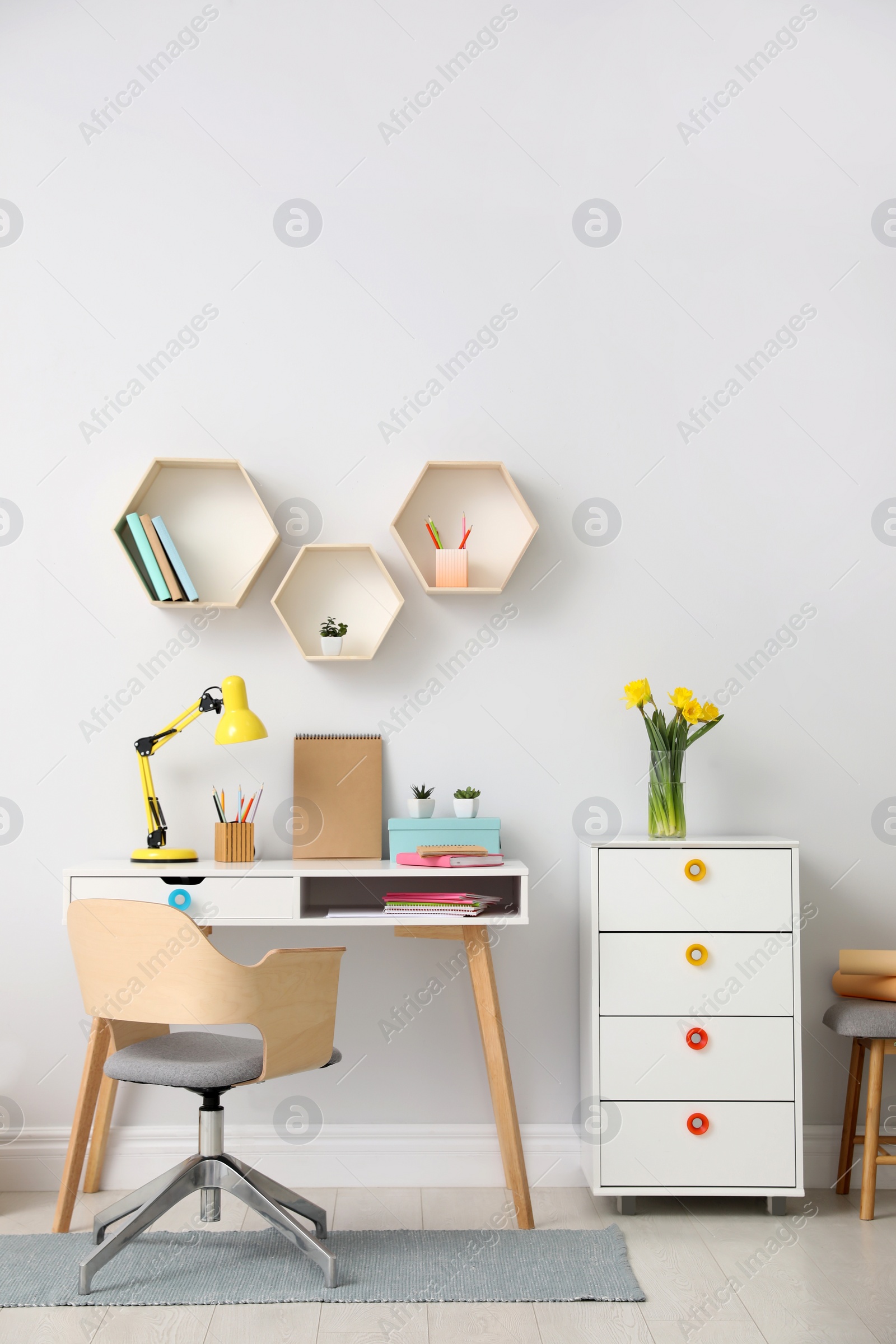 Photo of Stylish room interior with modern comfortable workplace