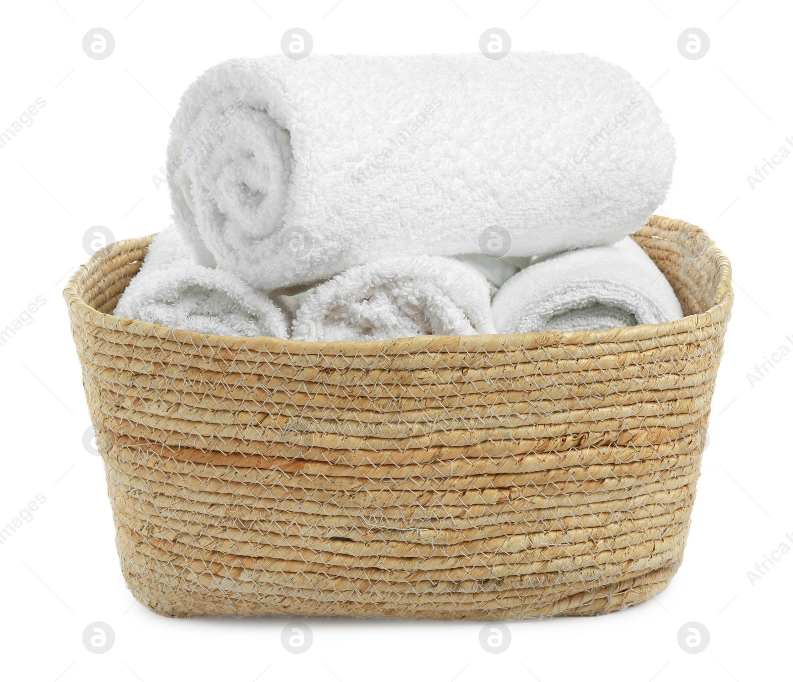 Photo of Wicker laundry basket with clean towels isolated on white