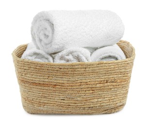 Photo of Wicker laundry basket with clean towels isolated on white