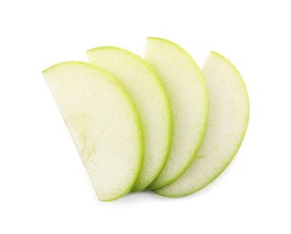 Photo of Slices of apple on white background, top view