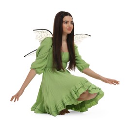 Photo of Beautiful girl in fairy costume with wings on white background