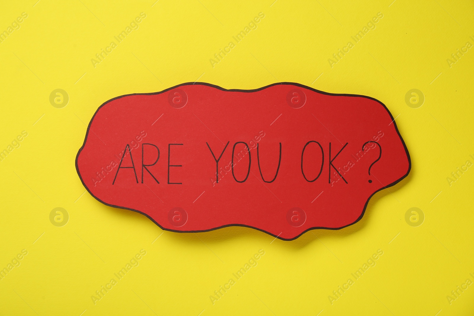 Photo of Red card with phrase Are You Ok? on yellow background