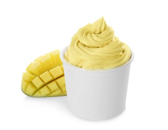 Cup of tasty frozen yogurt with mango on white background