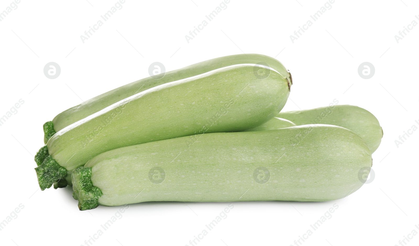 Photo of Fresh ripe green zucchinis isolated on white