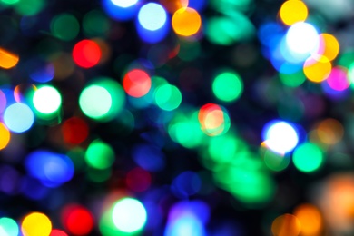 Photo of Blurred view of beautiful Christmas lights. Festive background