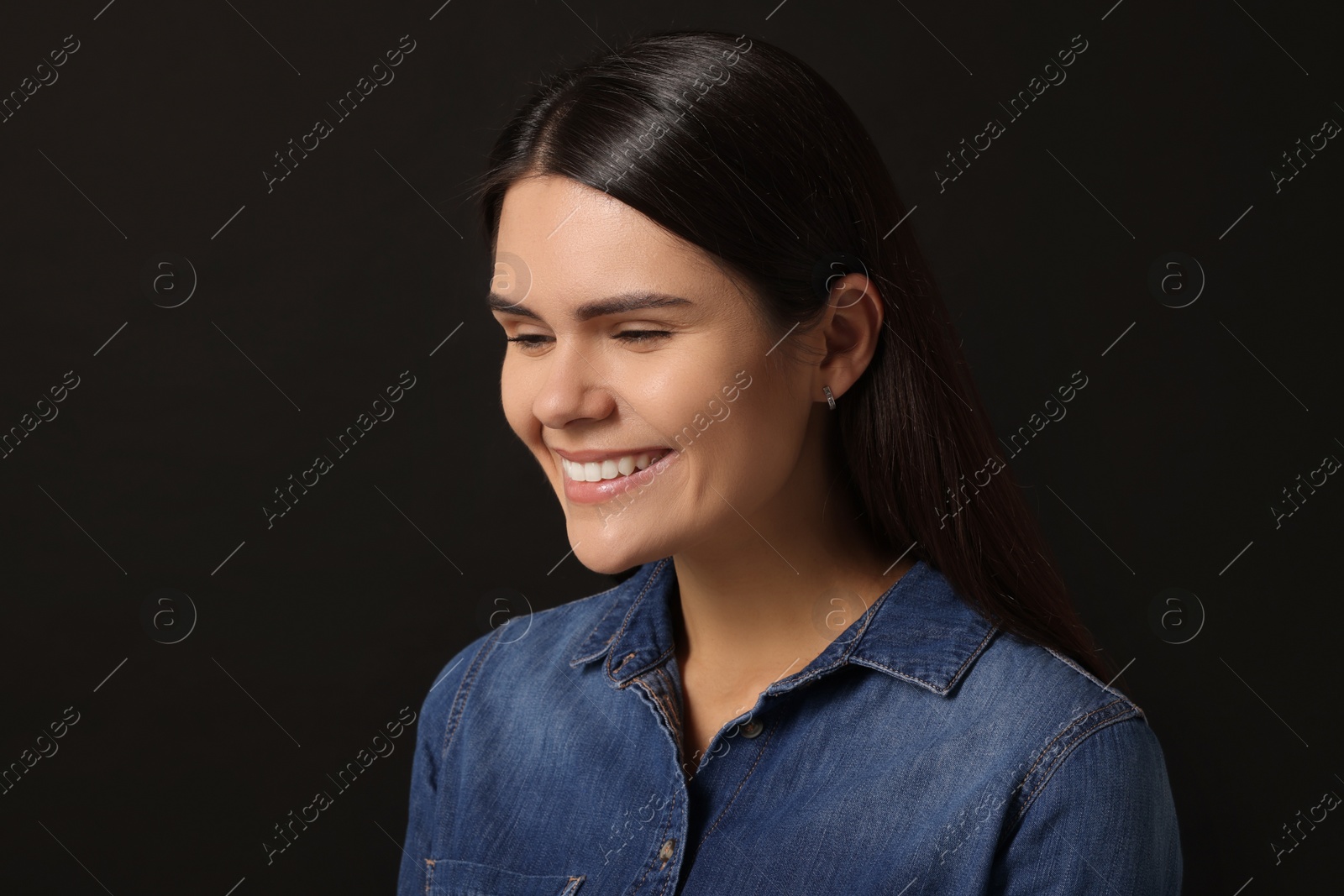 Photo of Personality concept. Emotional woman on black background