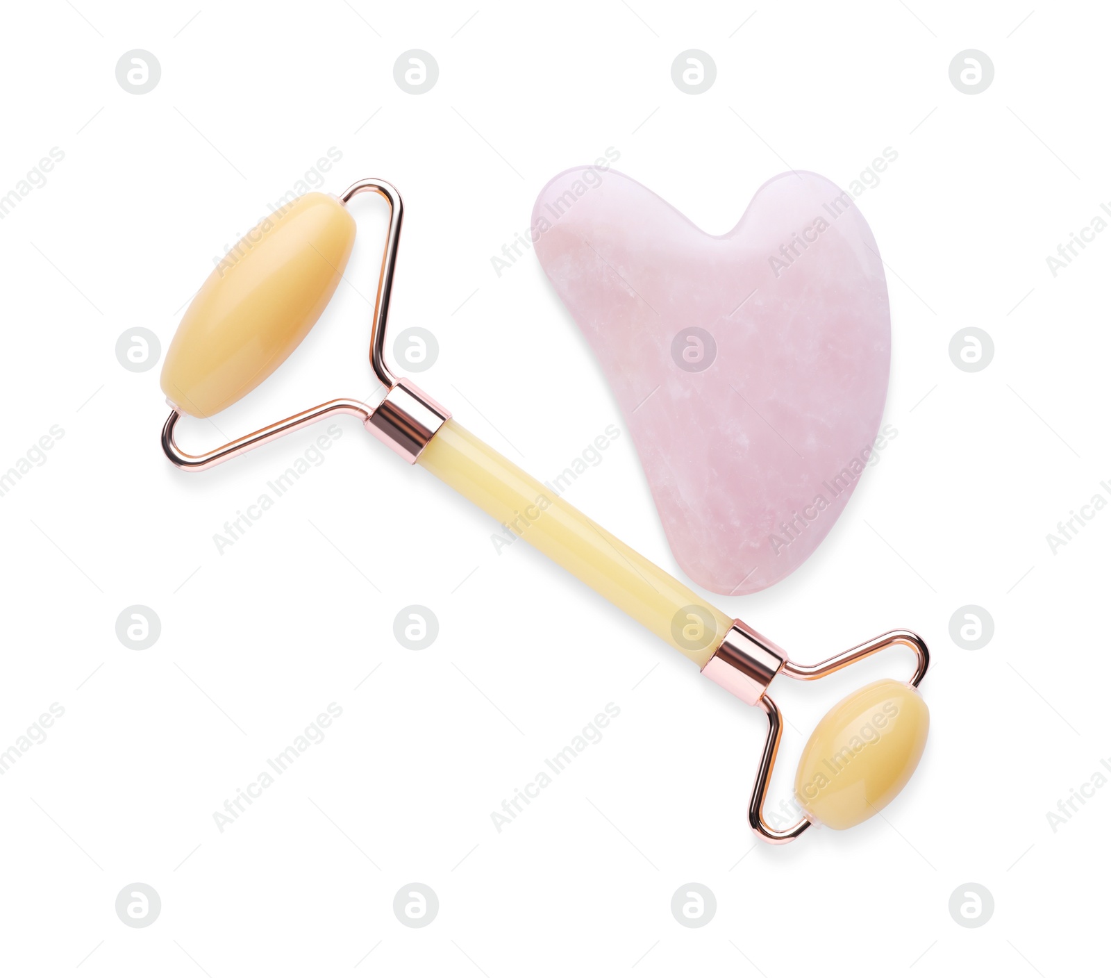 Photo of Gua sha tool and facial roller isolated on white, top view