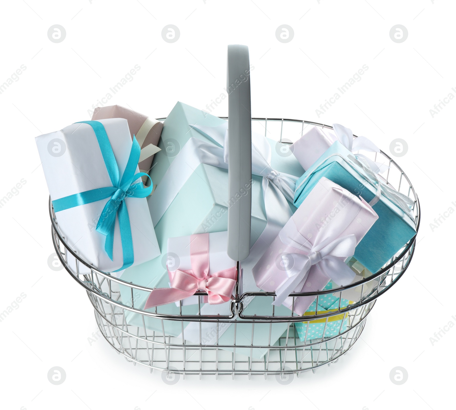 Photo of Shopping basket full of gift boxes on white background