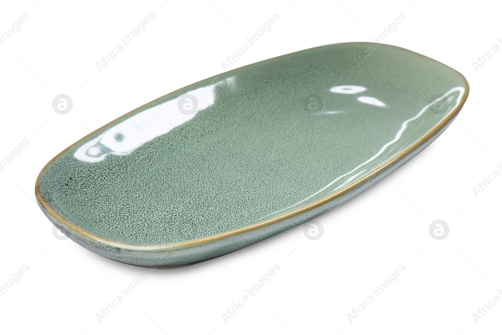 Photo of New green ceramic dish on white background