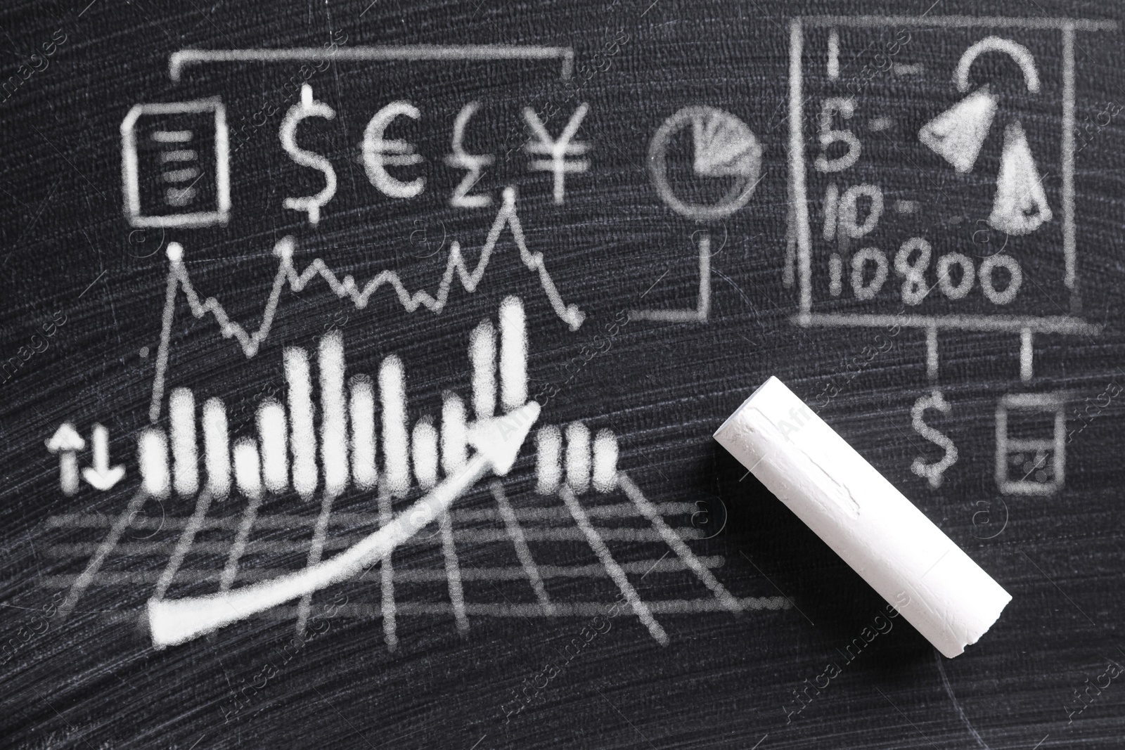 Image of Fintech concept. Charts with drawings and chalk on blackboard, top view