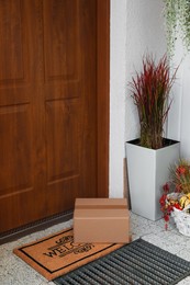 Photo of Parcel delivered on mat near front door