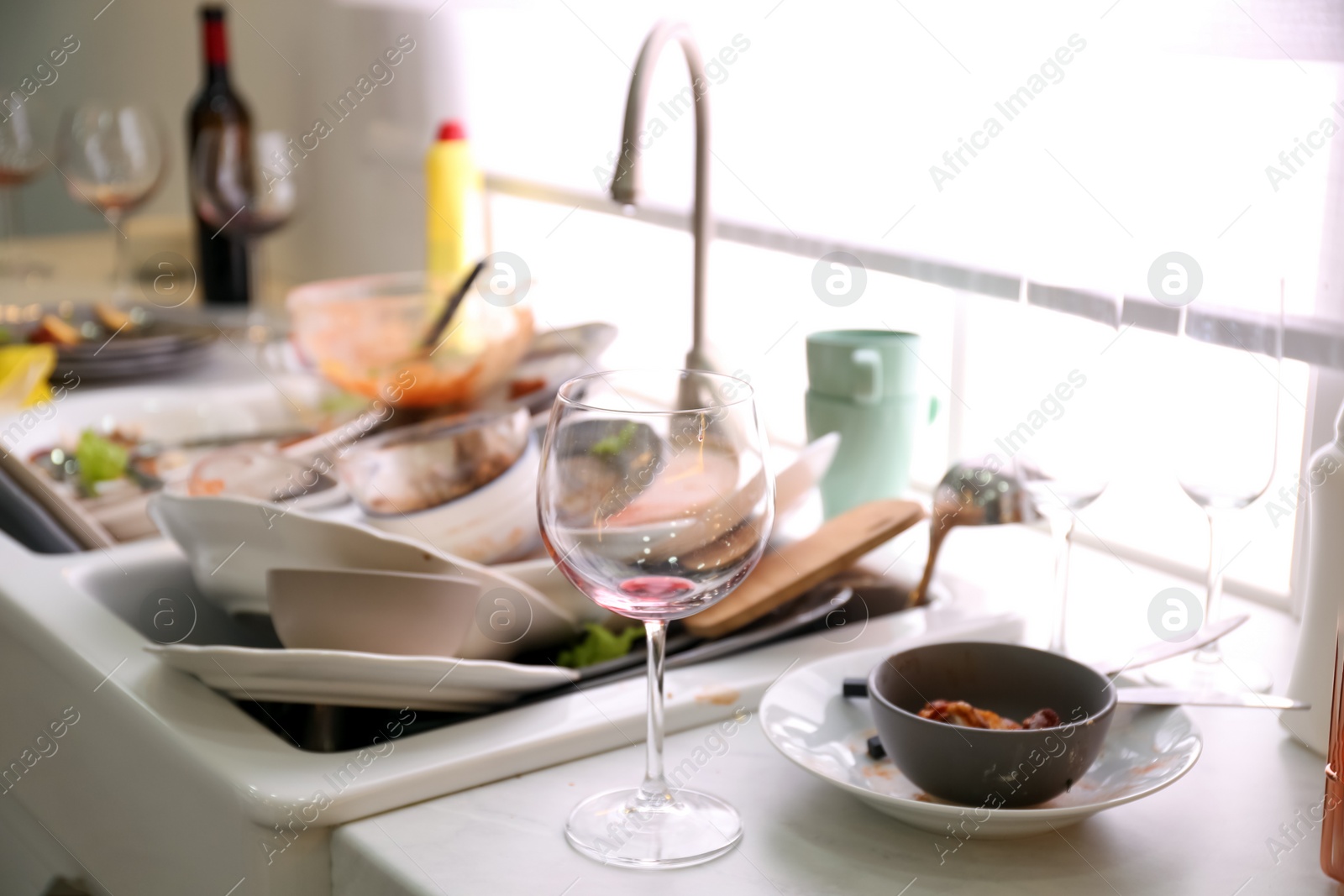 Photo of Dirty dishes in kitchen after new year party