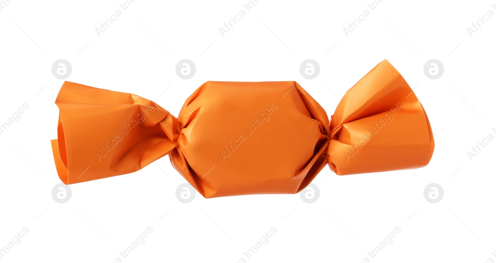 Photo of Delicious candy in orange wrapper isolated on white