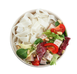 Tasty cooked rice noodles with vegetables isolated on white, top view