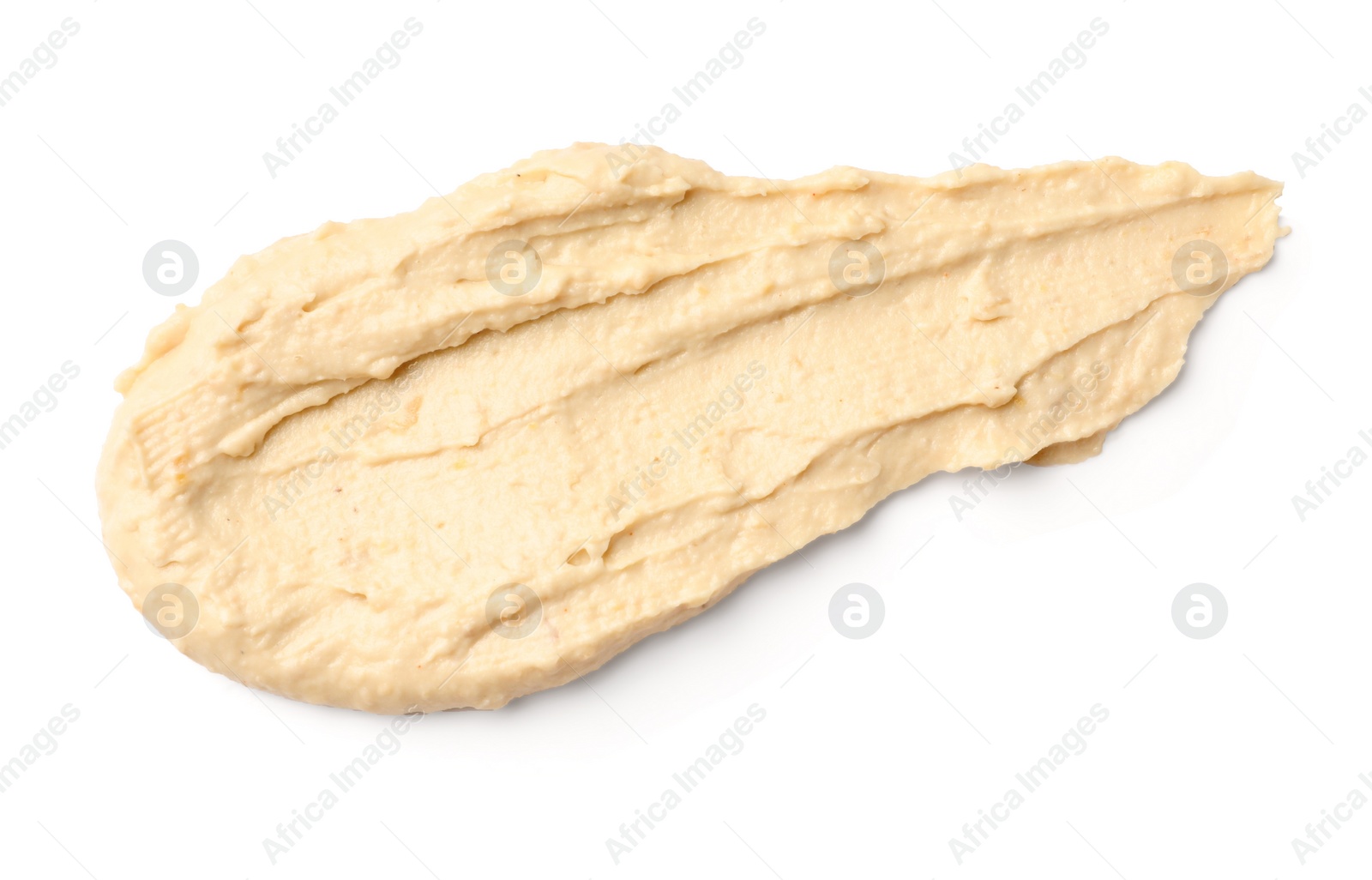 Photo of Smear of tasty hummus isolated on white, top view