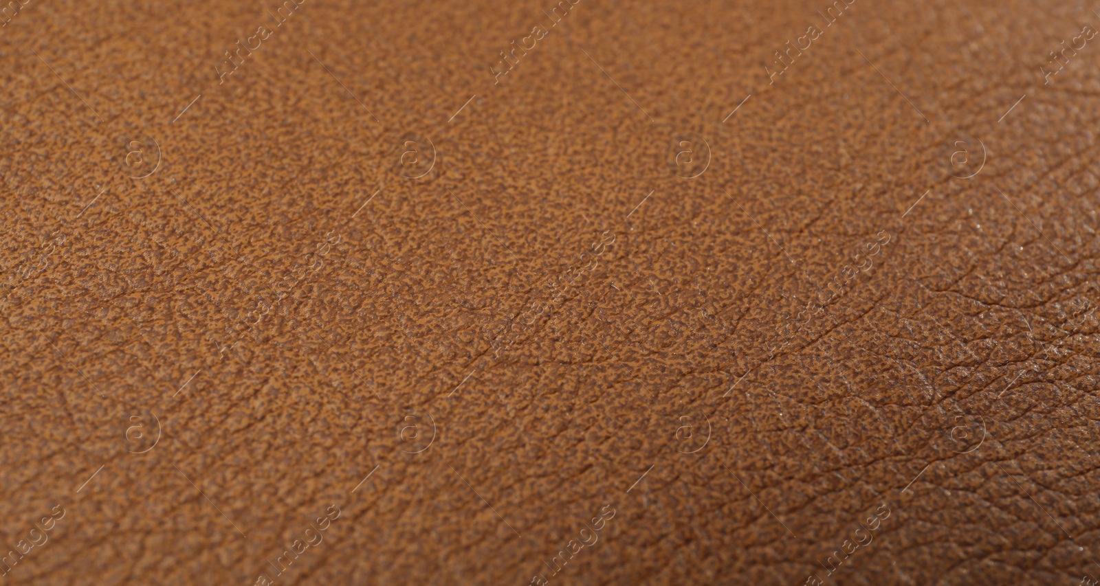 Photo of Light brown leather as background, above view