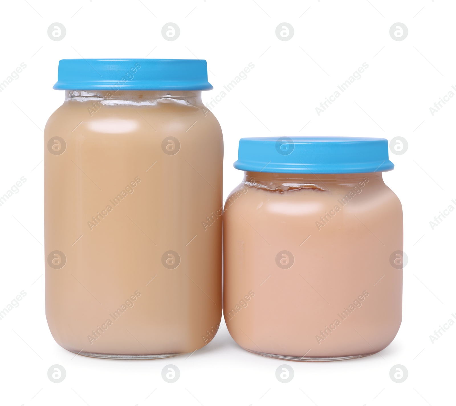 Photo of Glass jars with healthy baby food isolated on white