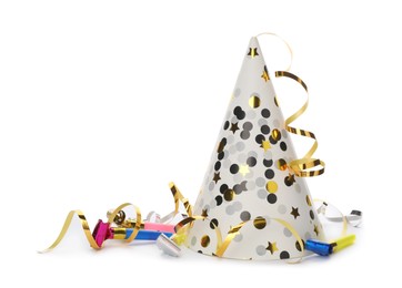 Photo of Party hat, blowers and confetti streamers on white background