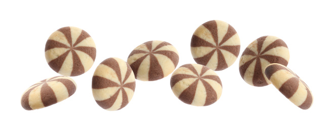 Set of falling delicious striped cookies on white background. Banner design 