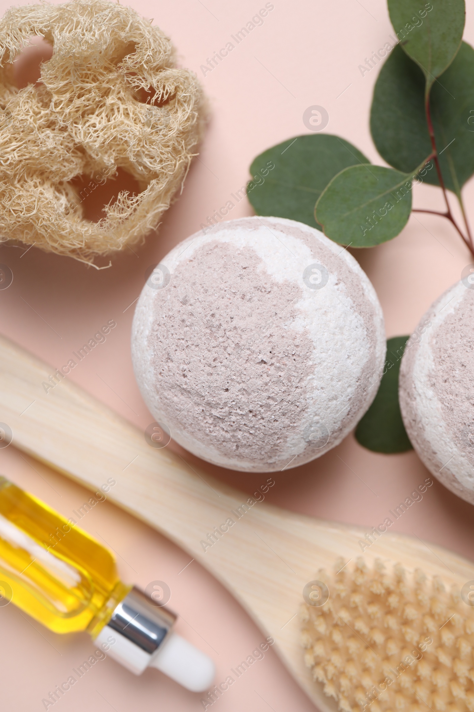 Photo of Flat lay composition with bath bombs on beige background