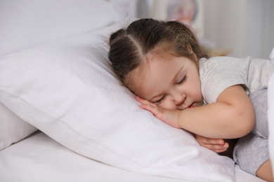 Photo of Cute little girl sleeping at home. Bedtime schedule