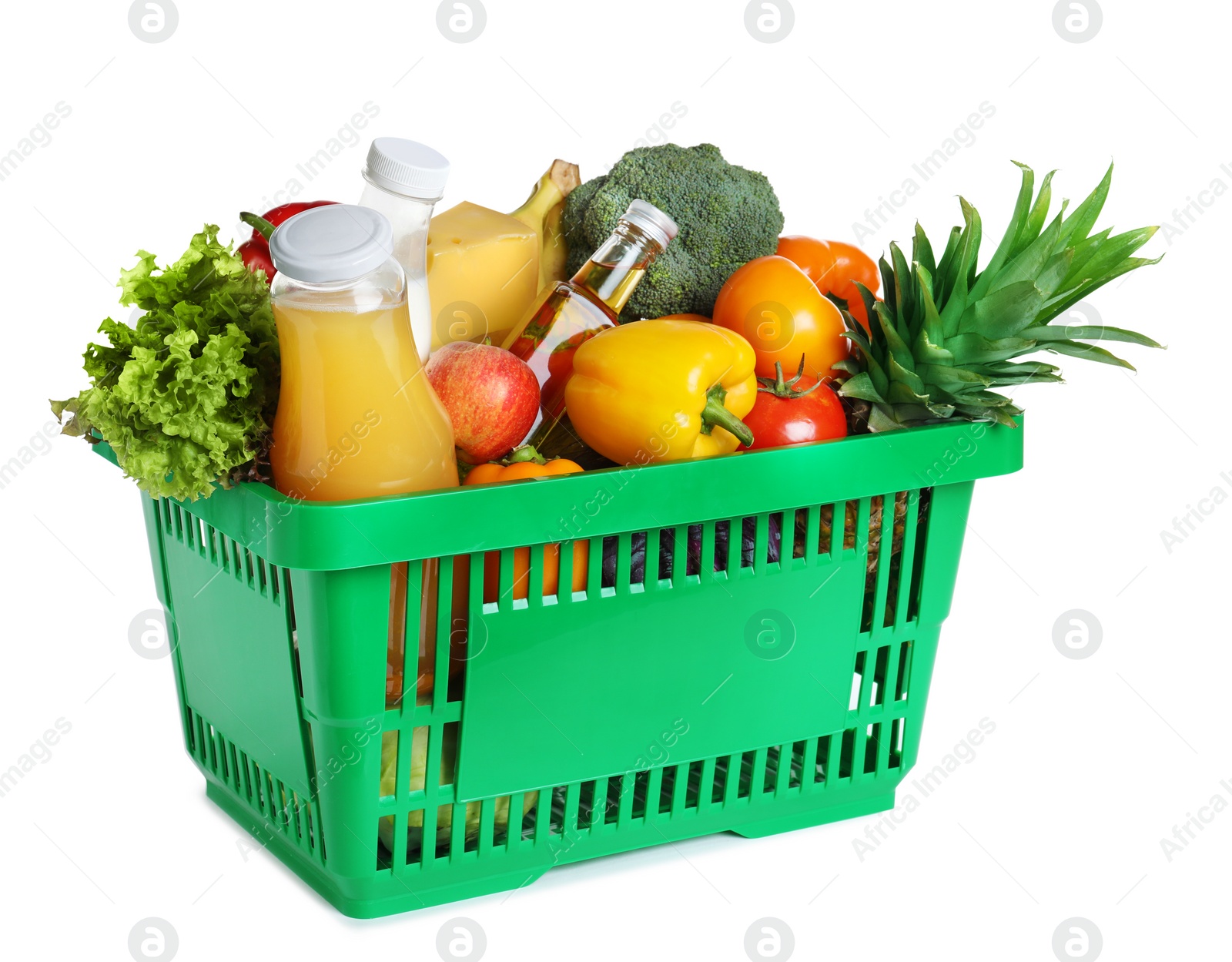 Photo of Shopping basket with grocery products on white background